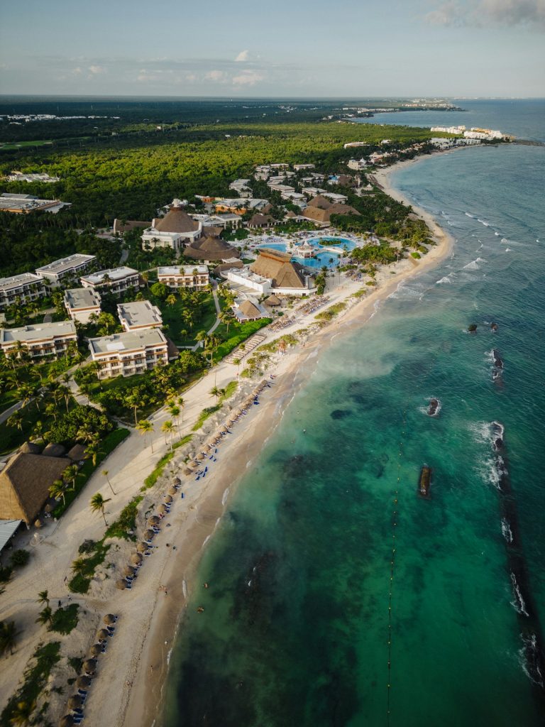 Buying property in Mexico as an American: aerial view of Riviera Maya beachfront hotels in the restricted zone