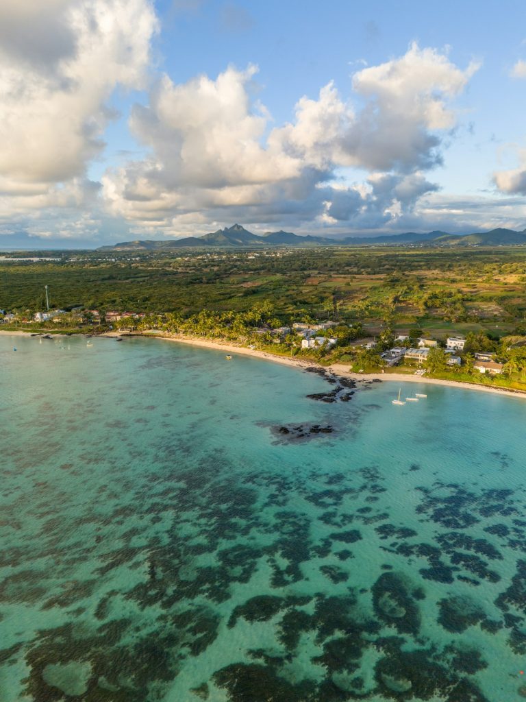 Ejido land in Mexico: aerial view of undeveloped Riviera Maya coastline where title status must be verified before purchase