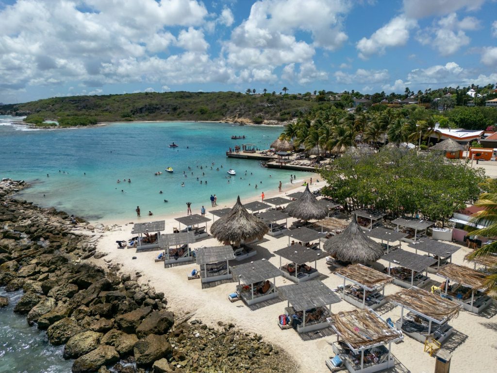 Mexico real estate investment: aerial view of Riviera Maya beachfront hotels and turquoise Caribbean coastline