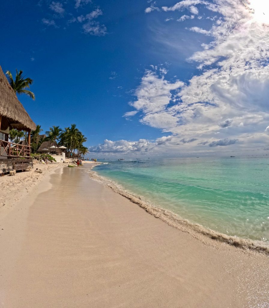 Beachfront palapa on the Riviera Maya coast, illustrating Playa del Carmen real estate