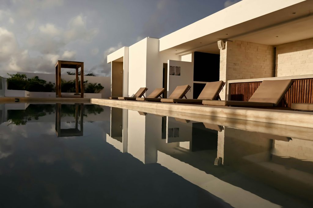 Hotel valuation: pool deck and lounge chairs at a modern boutique hotel